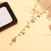 COLLIER DORE - EN Y A PERLES ET FLEURS